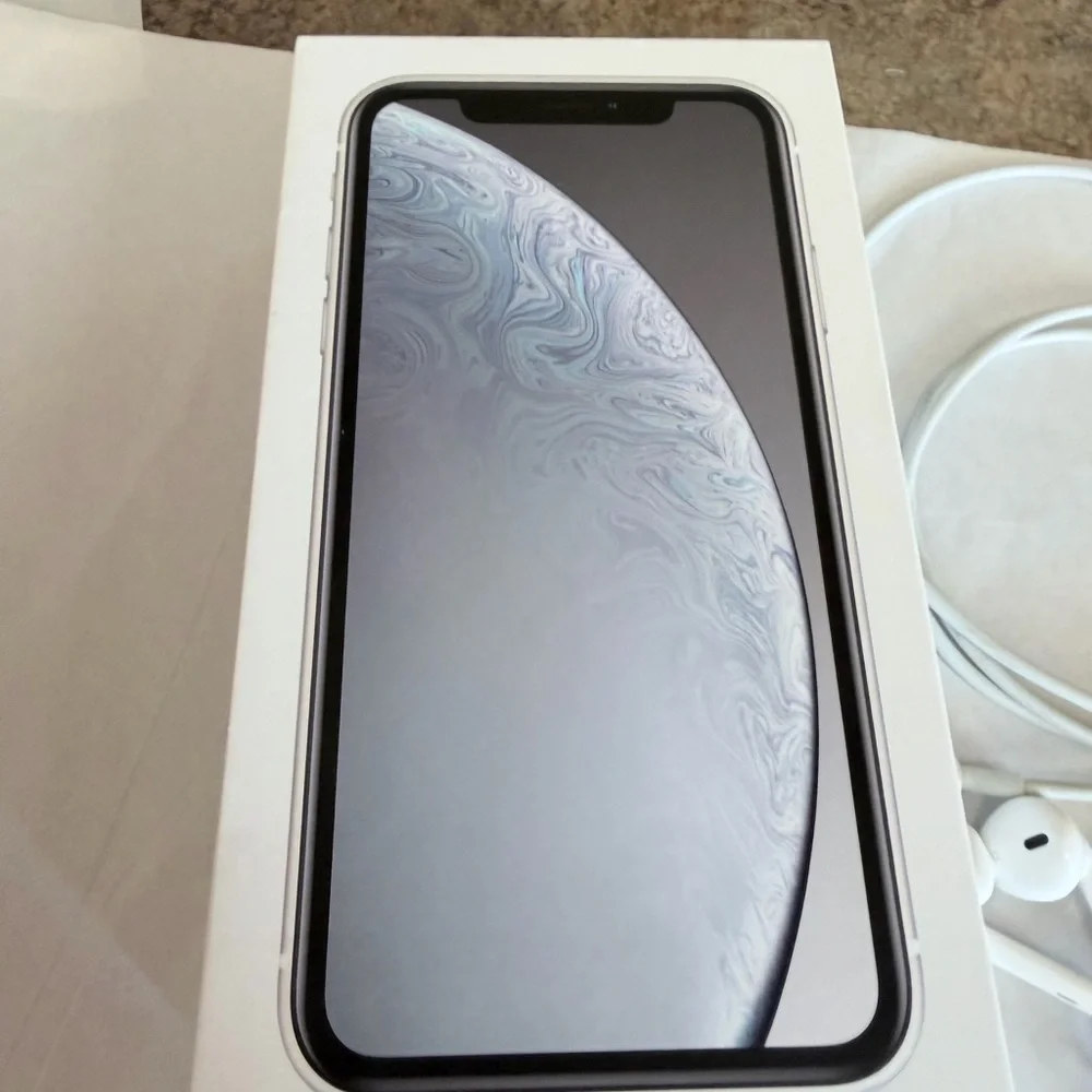 Apple iPhone with White Earphones